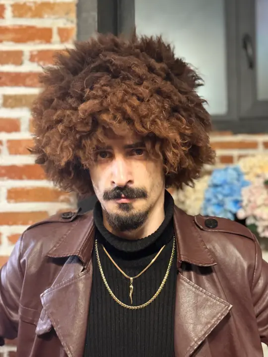 Brown sheepskin papakha hat with natural curly wool, front view