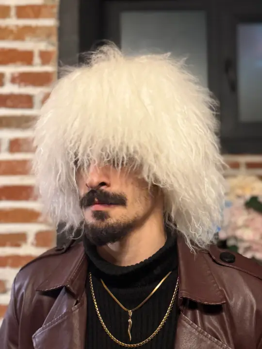 White goat fur papakha hat with long natural hair, front view